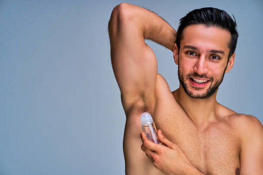 A Nivea Men Deodorant Roll On - Cool Kick positioned on a bathroom countertop, surrounded by a towel and grooming essentials, conveying a refreshing morning routine for a cool start to the day.